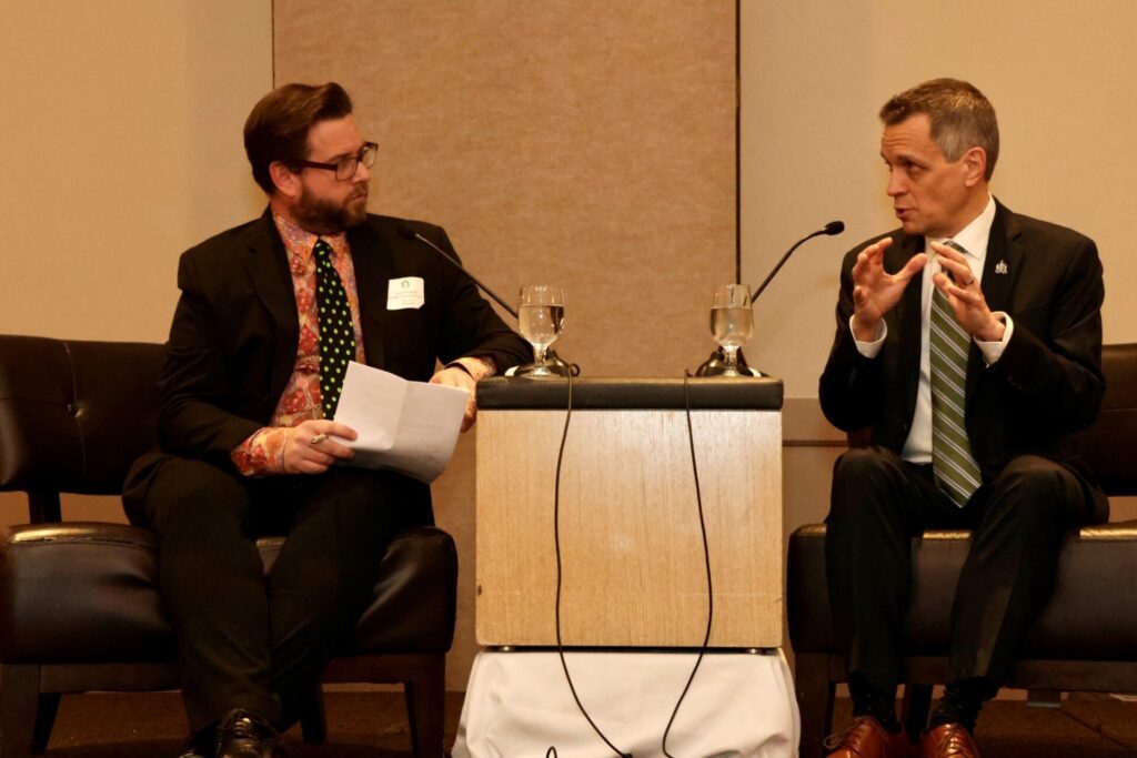 GOHBA executive director Jason Burggraaf, left, in a 'fireside chat' with Mayor Mark Sutcliffe at the Greater Ottawa Home Builders' Association breakfast social, held Wednesday, Jan. 18, 2023. Photo by Caroline Phillips