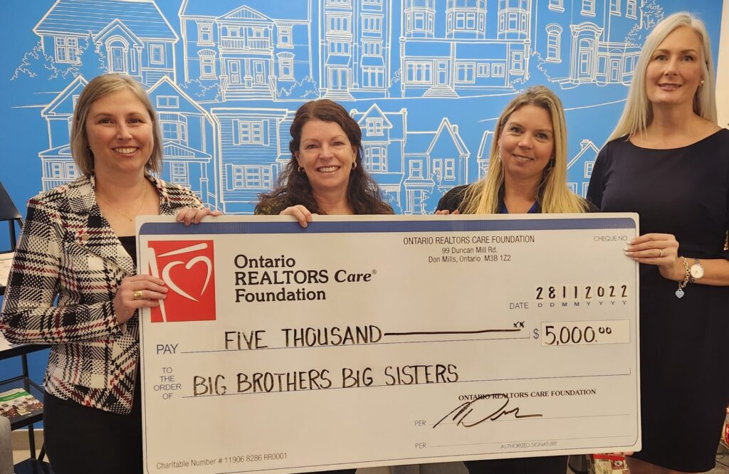 From left to right: Sandra Burelli, Executive Director of Big Brothers Big Sisters of Lanark County, REALTOR® Brenda Gray, and REALTORS Care® Committee vice-chair Julie Milne and chair Tami Eades.